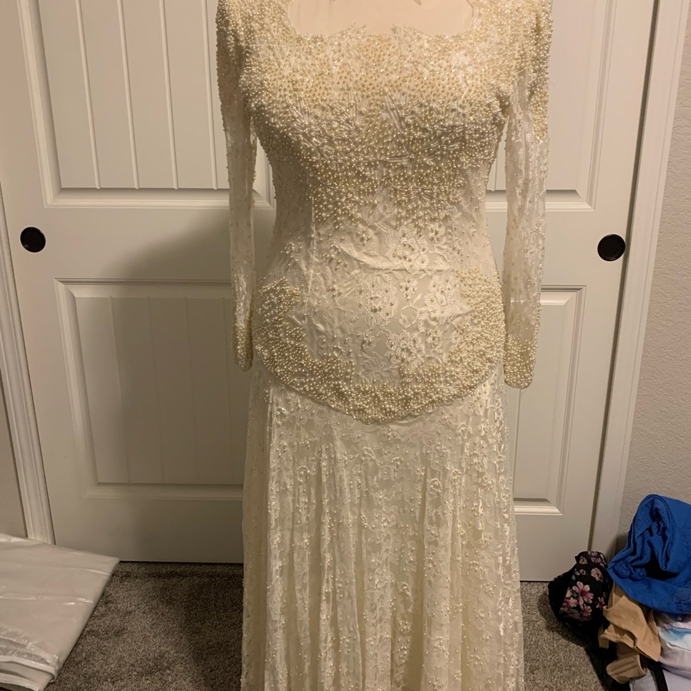 D-17 Precious Moments Cream Bishop Sleeve Bridal Gown